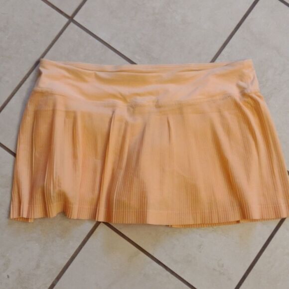 Lululemon Pleat to Street Mid-Rise Skirt Summer Glow light orange pleated 12 - Picture 2 of 14